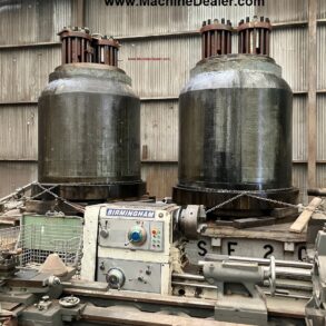 ONE PREOWNED BLISS 7000 TON  VERTICAL HYDRAULIC DOWN ACTING FOUR POST GUIDED RAM PRESS MODEL HS-7000-4R-48-144  AGE 1954